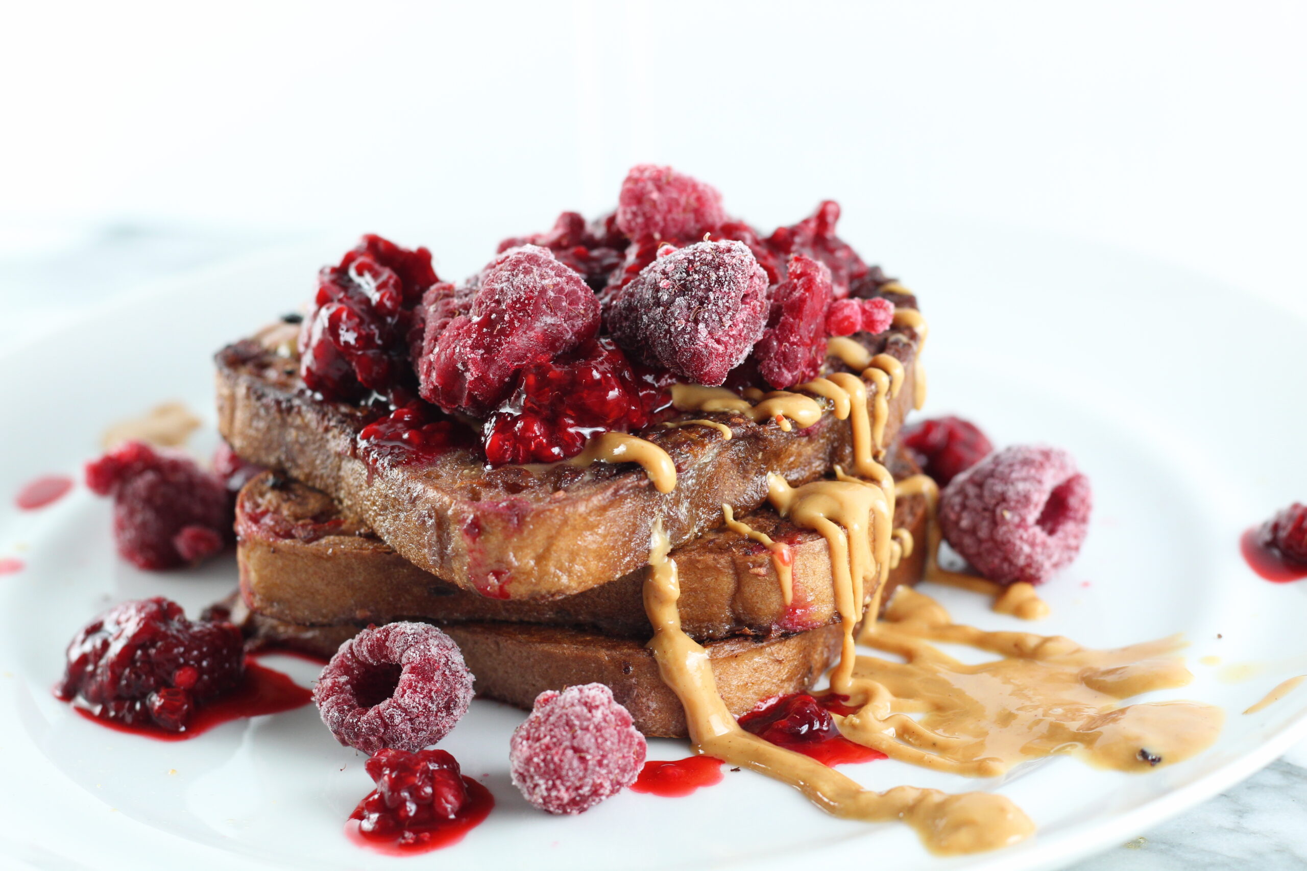 Raspberry French Toast drizzled with peanut butter