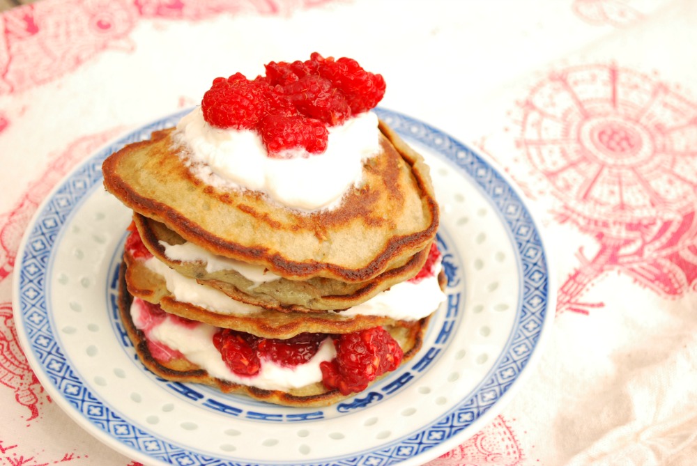 Light & fluffy and infused with frozen raspberries – with extra ricotta cheese and frozen raspberries piled in-between – these Raspberry Ricotta Pancakes are no ordinary breakfast or brunch.