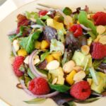 Raspberry, Avocado & Mango Salad, with mixed greens, red onion and almonds