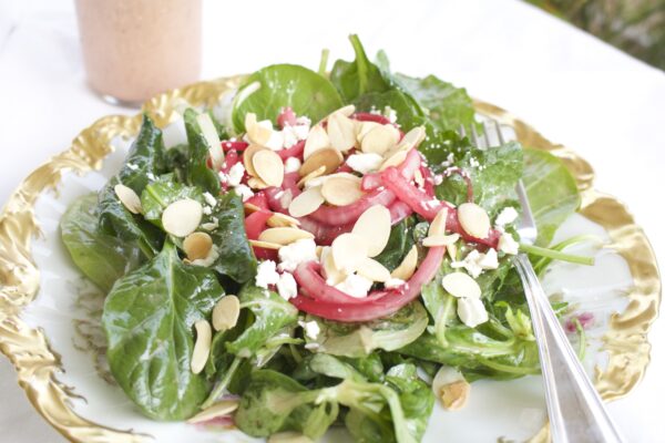 Spinach And Frisee Salad With Raspberry Pickled Onions & Raspberry Vinaigrette